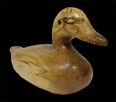 Carved Golden Eye Duck by Earl M. Brinton